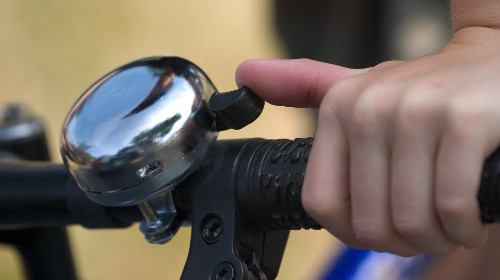 bike bell being rung on handle bars